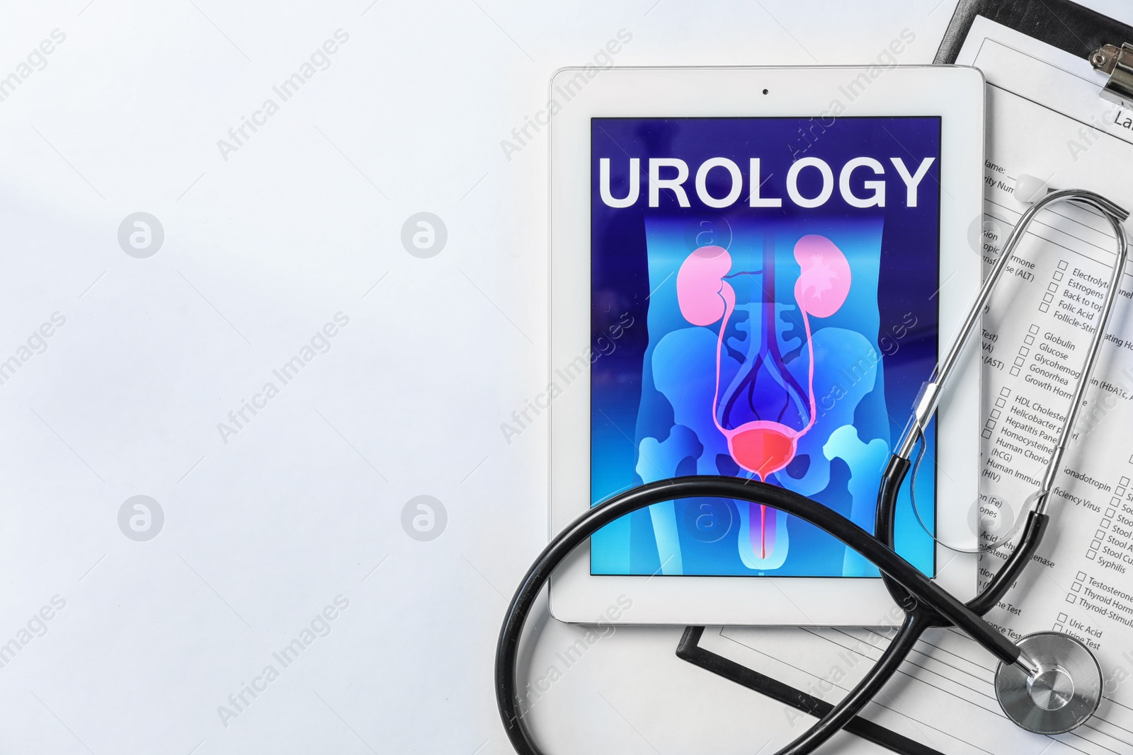 Photo of Flat lay composition with tablet, stethoscope and test form on light background. Urology concept