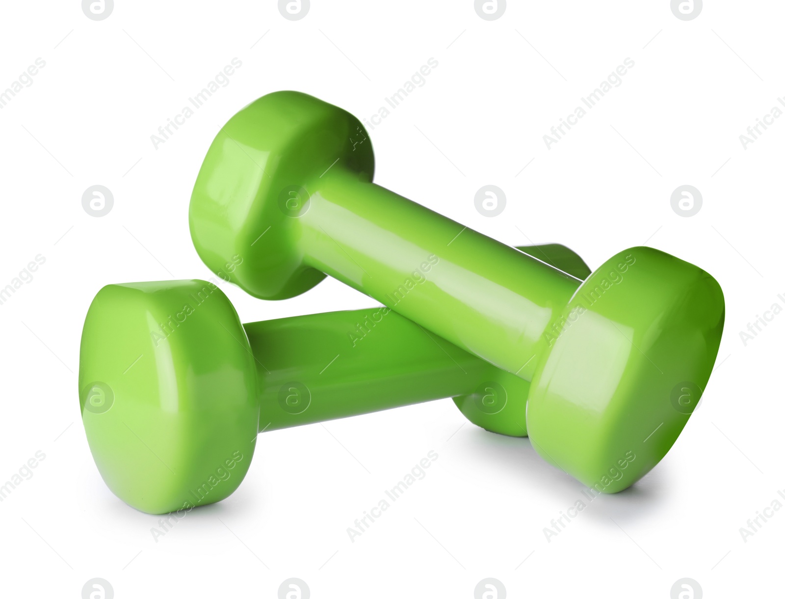 Photo of Color dumbbells on white background. Home fitness