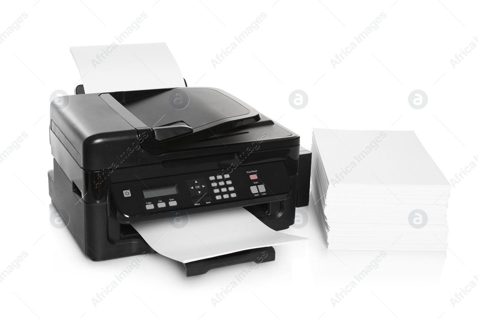 Photo of Modern printer and stack of paper on white background