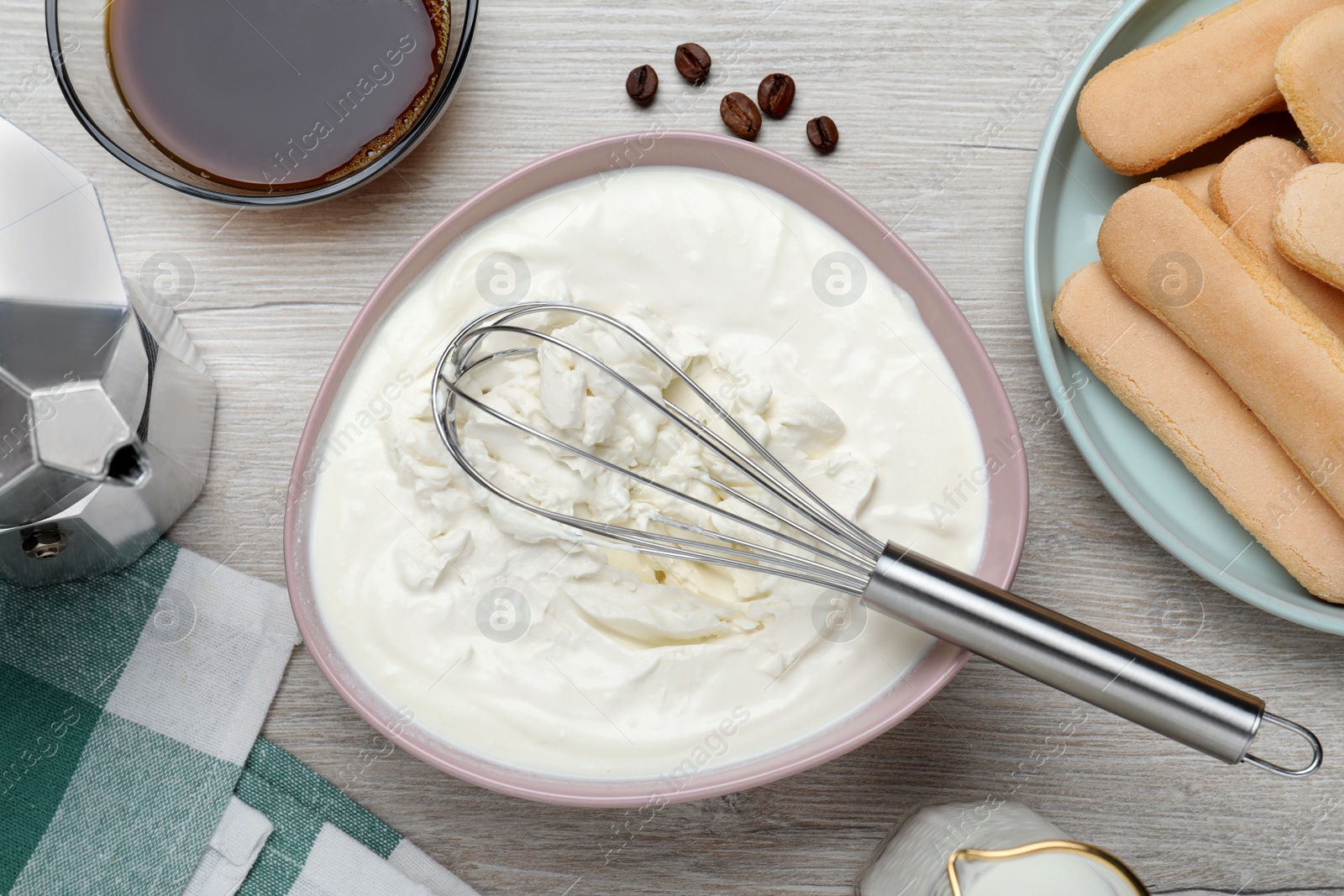 Photo of Flat lay composition with different ingredients for tiramisu cake on white wooden table