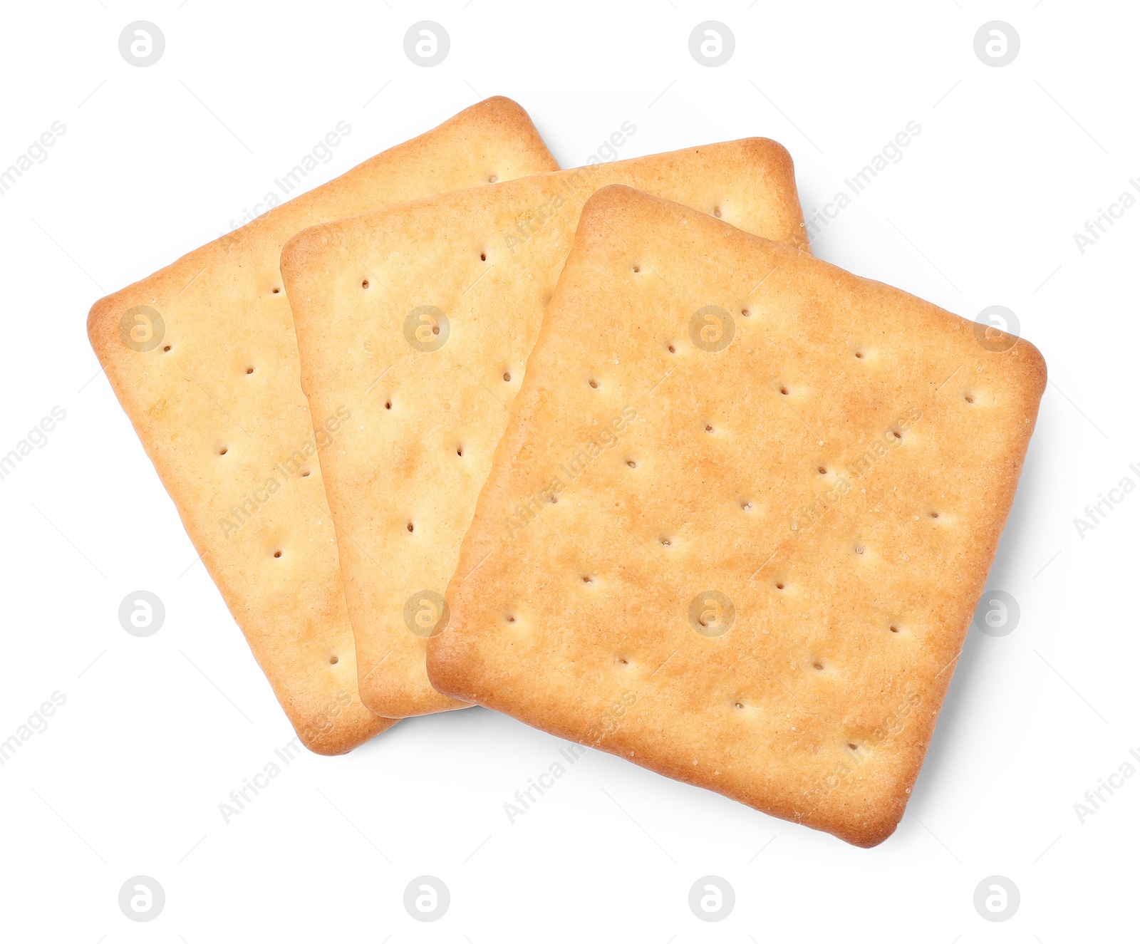 Photo of Three crispy crackers isolated on white, top view. Delicious snack