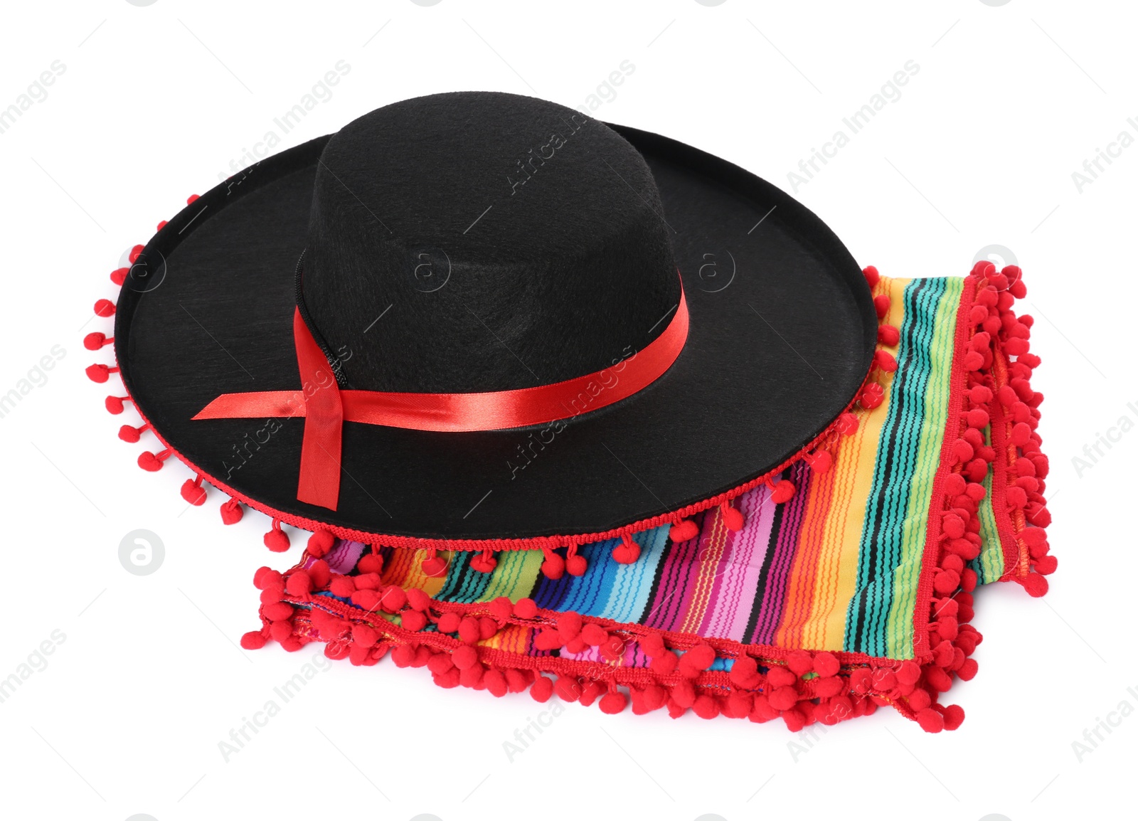 Photo of Mexican sombrero hat and colorful poncho isolated on white