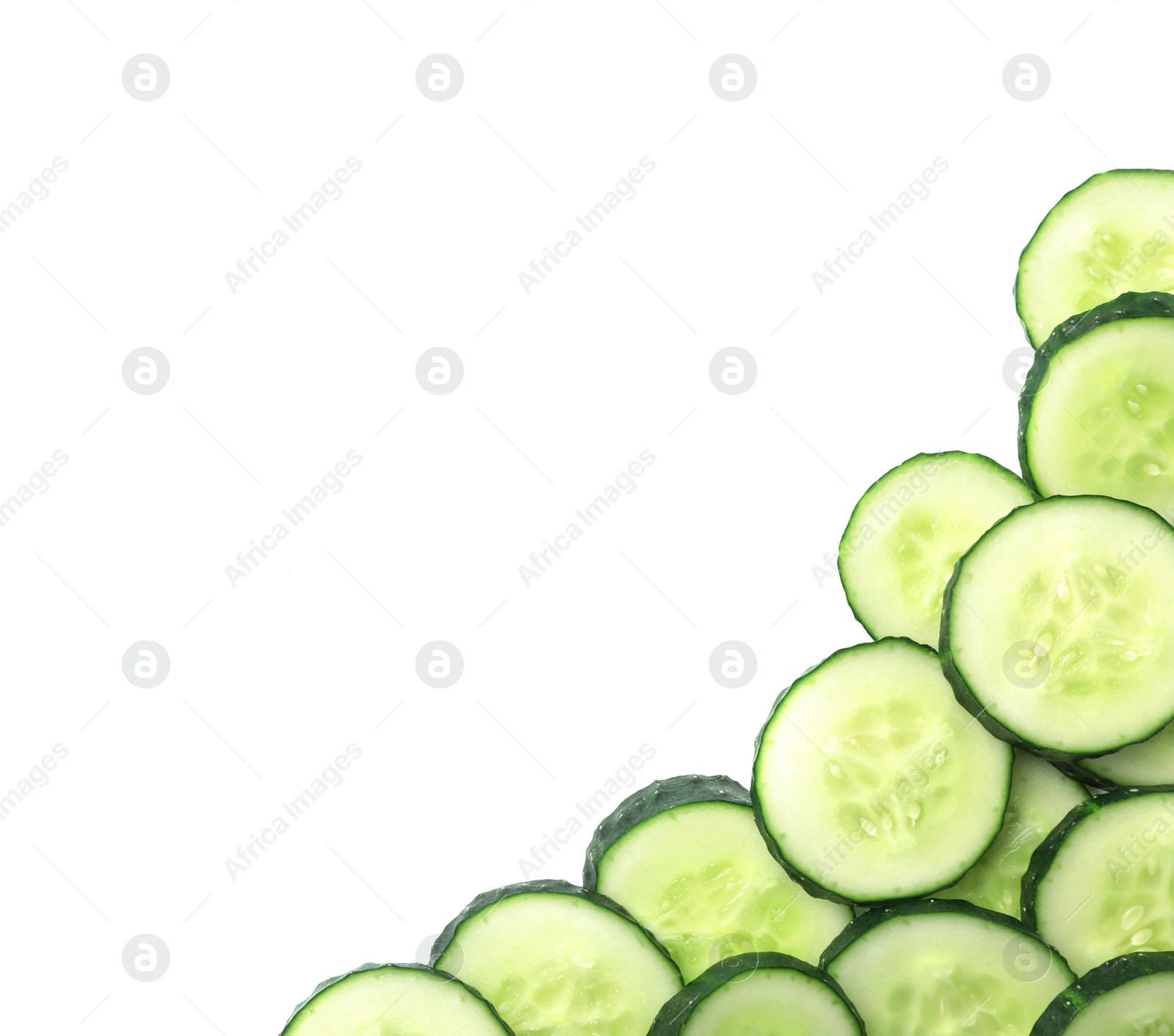 Photo of Slices of cucumbers on white background, top view