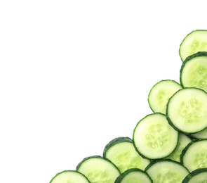 Photo of Slices of cucumbers on white background, top view