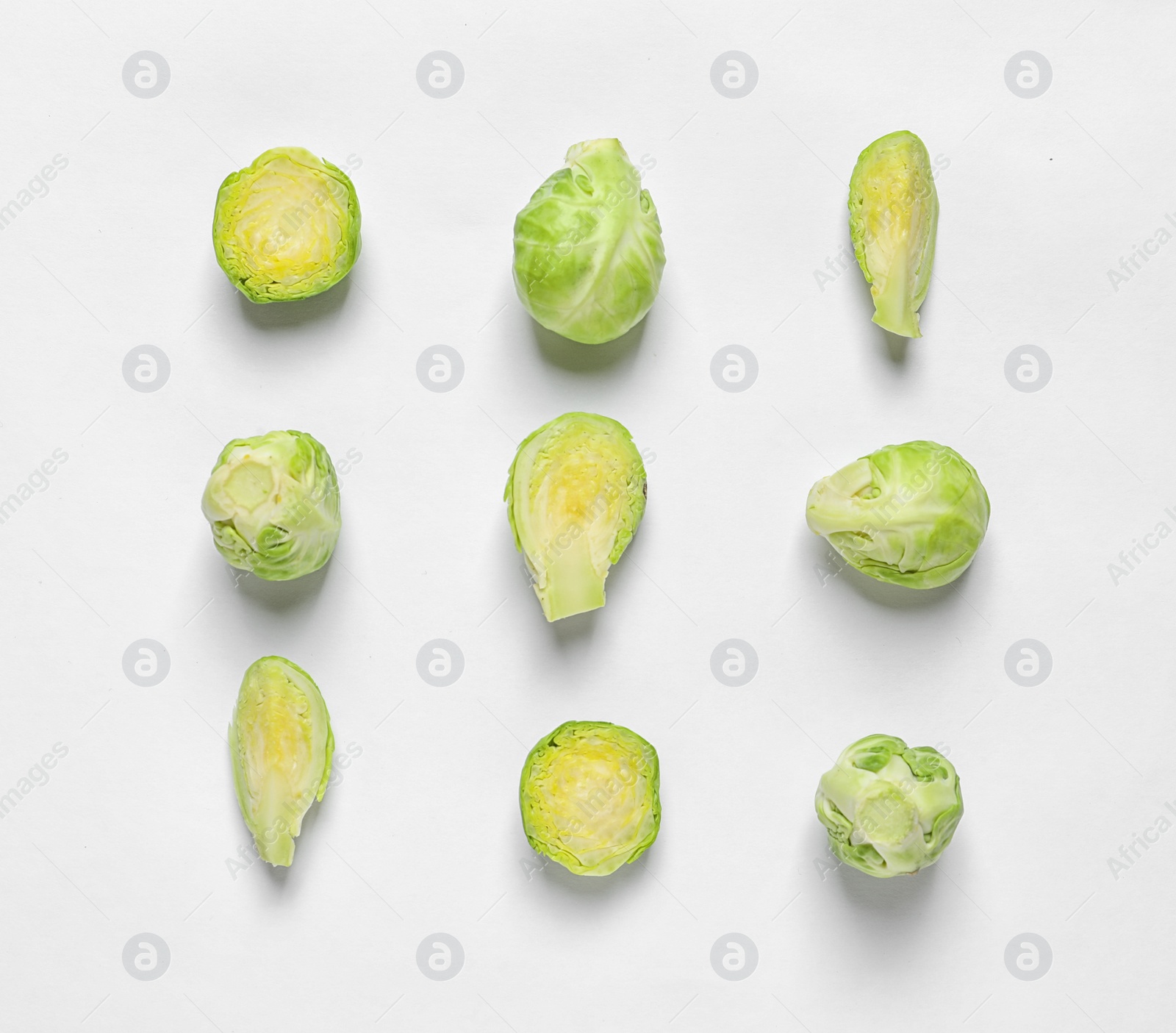 Photo of Tasty fresh Brussels sprouts on white background, top view