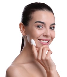 Photo of Woman using silkworm cocoon in skin care routine on white background