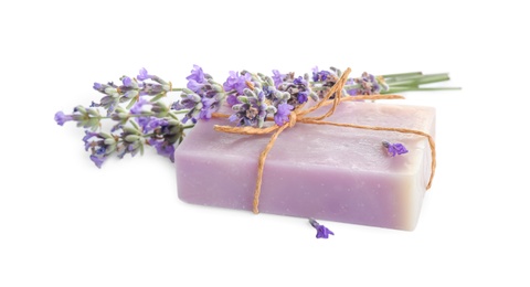 Photo of Hand made soap bar with lavender flowers on white background