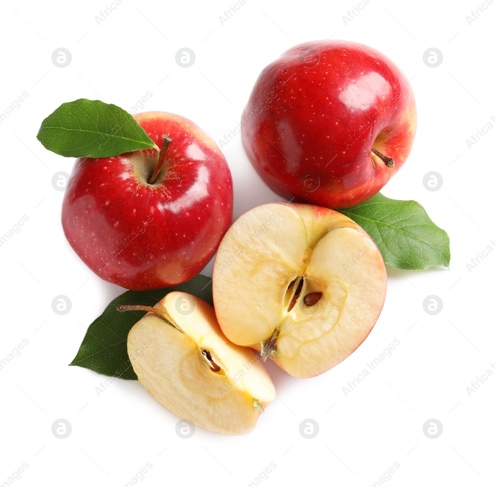 Photo of Ripe red apples with slices on white background