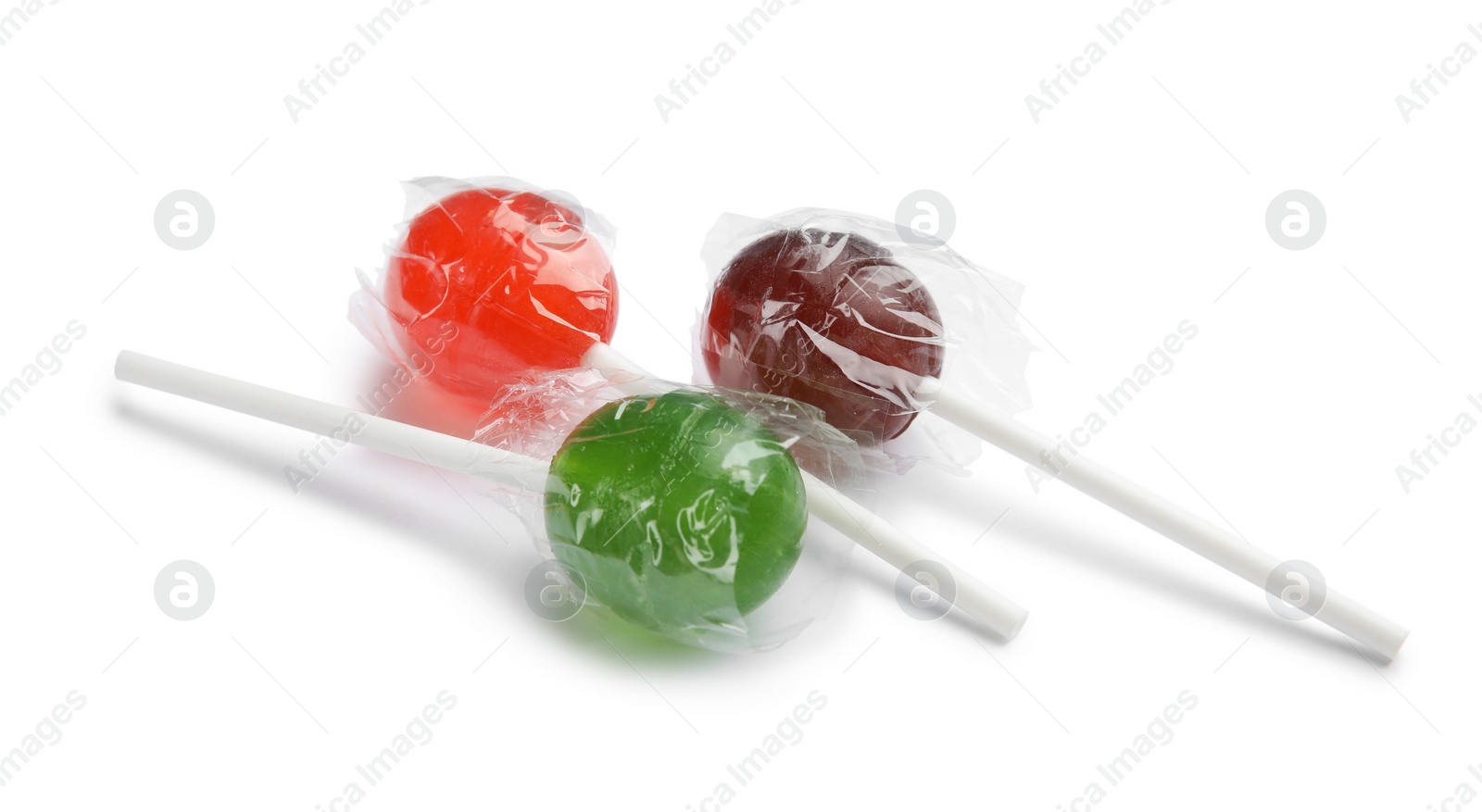 Photo of Different delicious colorful candies on white background