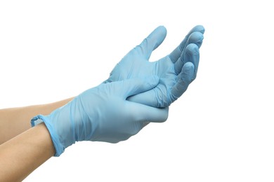 Photo of Doctor wearing light blue medical gloves on white background, closeup