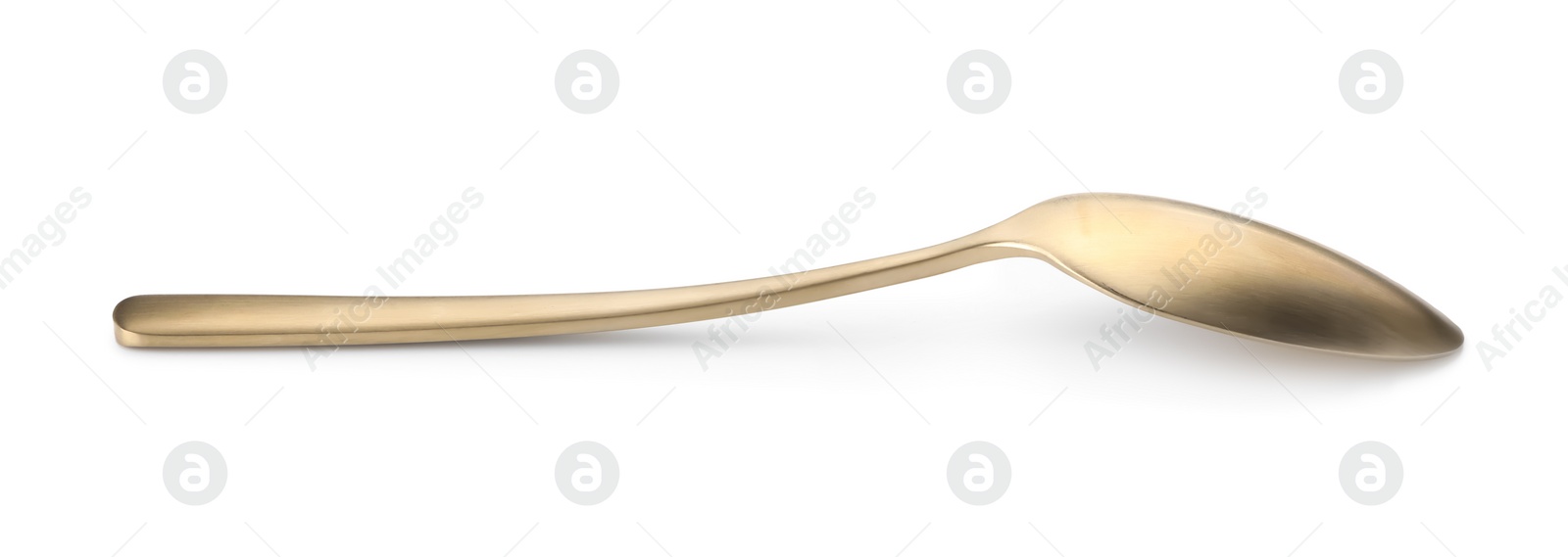 Photo of One shiny golden spoon isolated on white