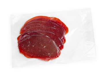 Photo of Slices of tasty bresaola isolated on white, top view