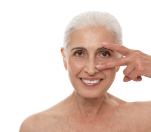 Portrait of beautiful mature woman on white background