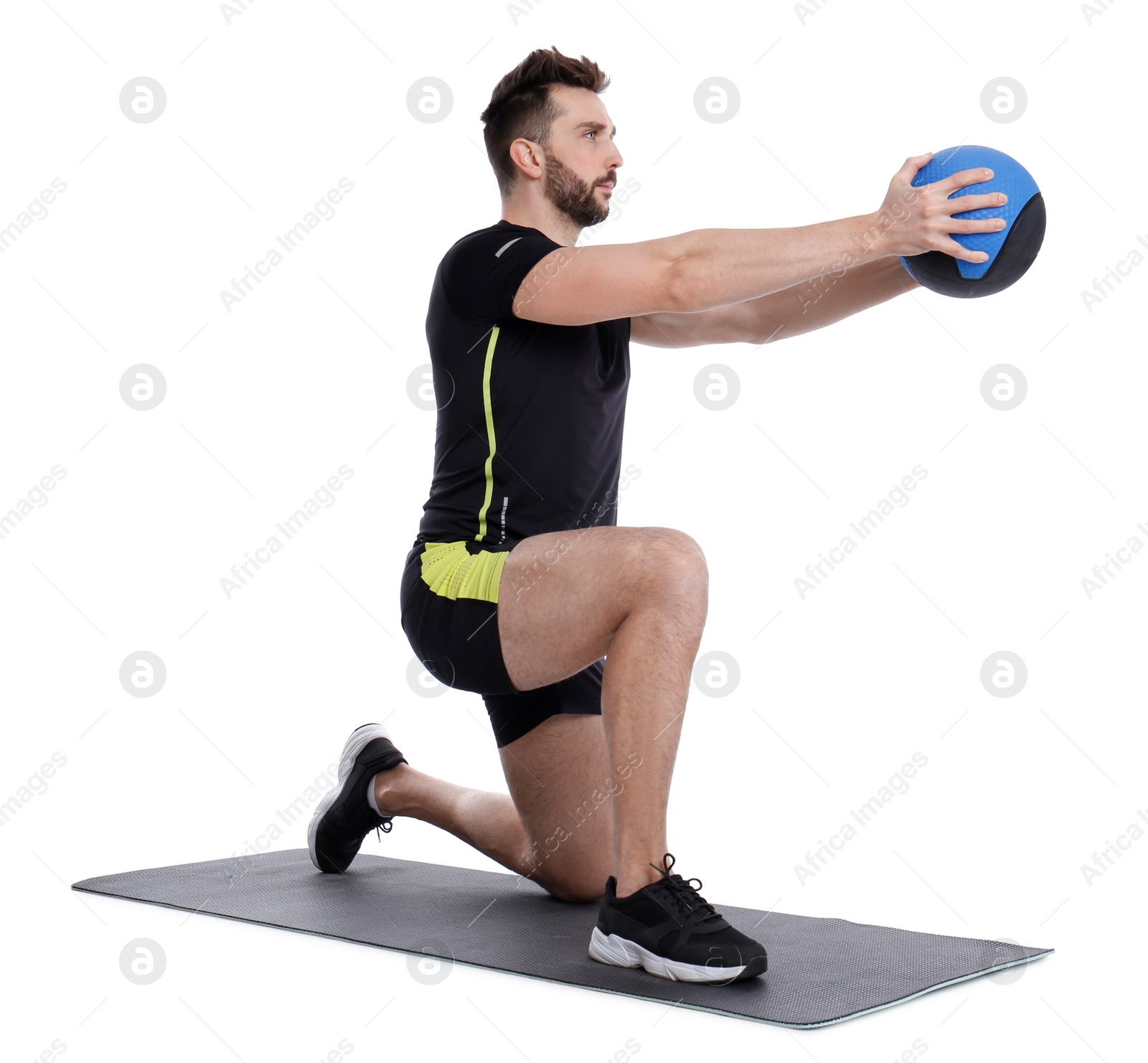 Photo of Athletic man doing exercise with medicine ball isolated on white