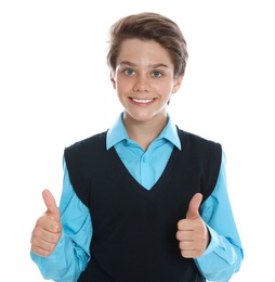 Happy boy in school uniform on white background