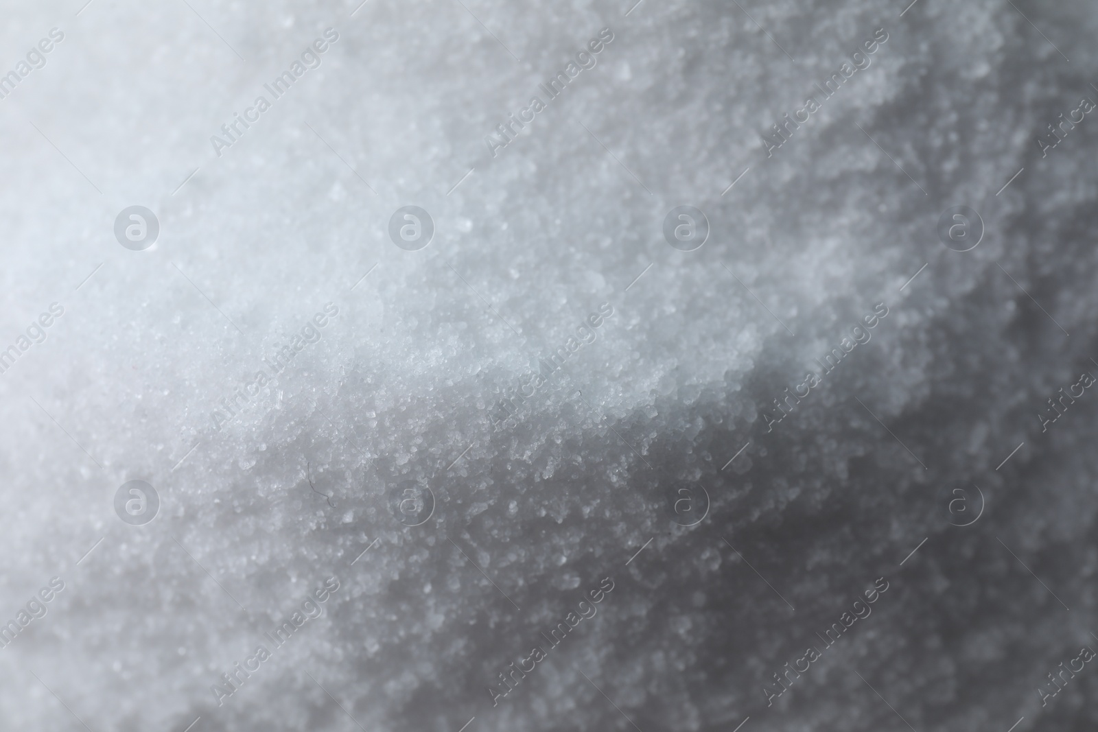 Photo of Organic white sea salt as background, above view