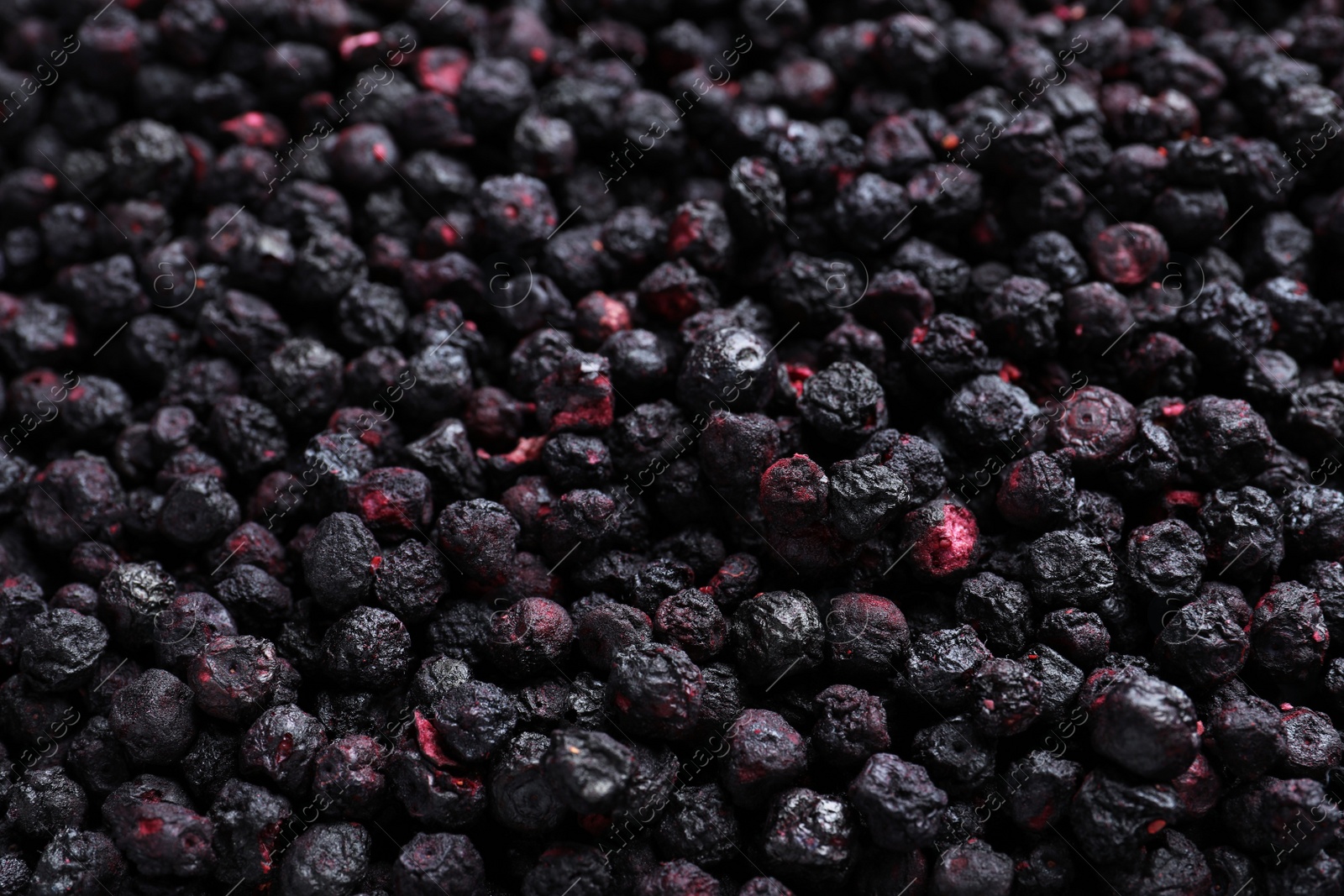 Photo of Closeup of freeze dried blueberries as background