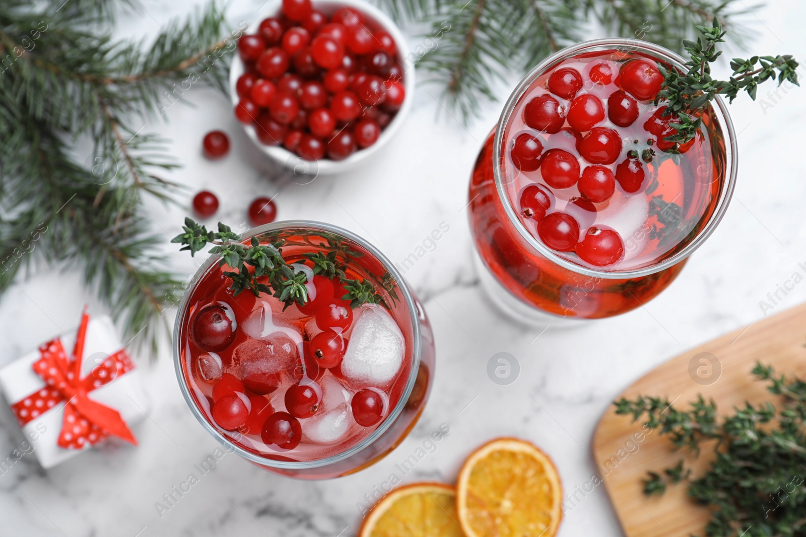 Photo of Flat lay composition with delicious Christmas liqueur on white marble table