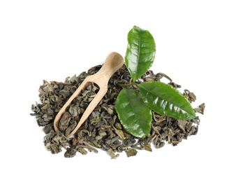 Photo of Fresh and dry leaves of tea plant with wooden scoop on white background