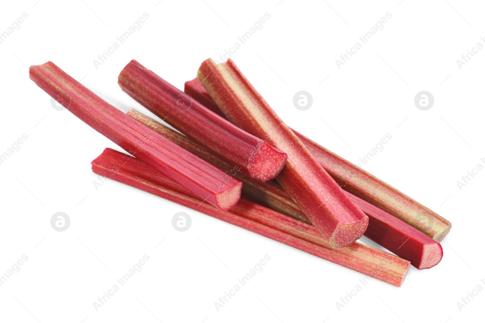 Photo of Stalks of fresh ripe rhubarb isolated on white