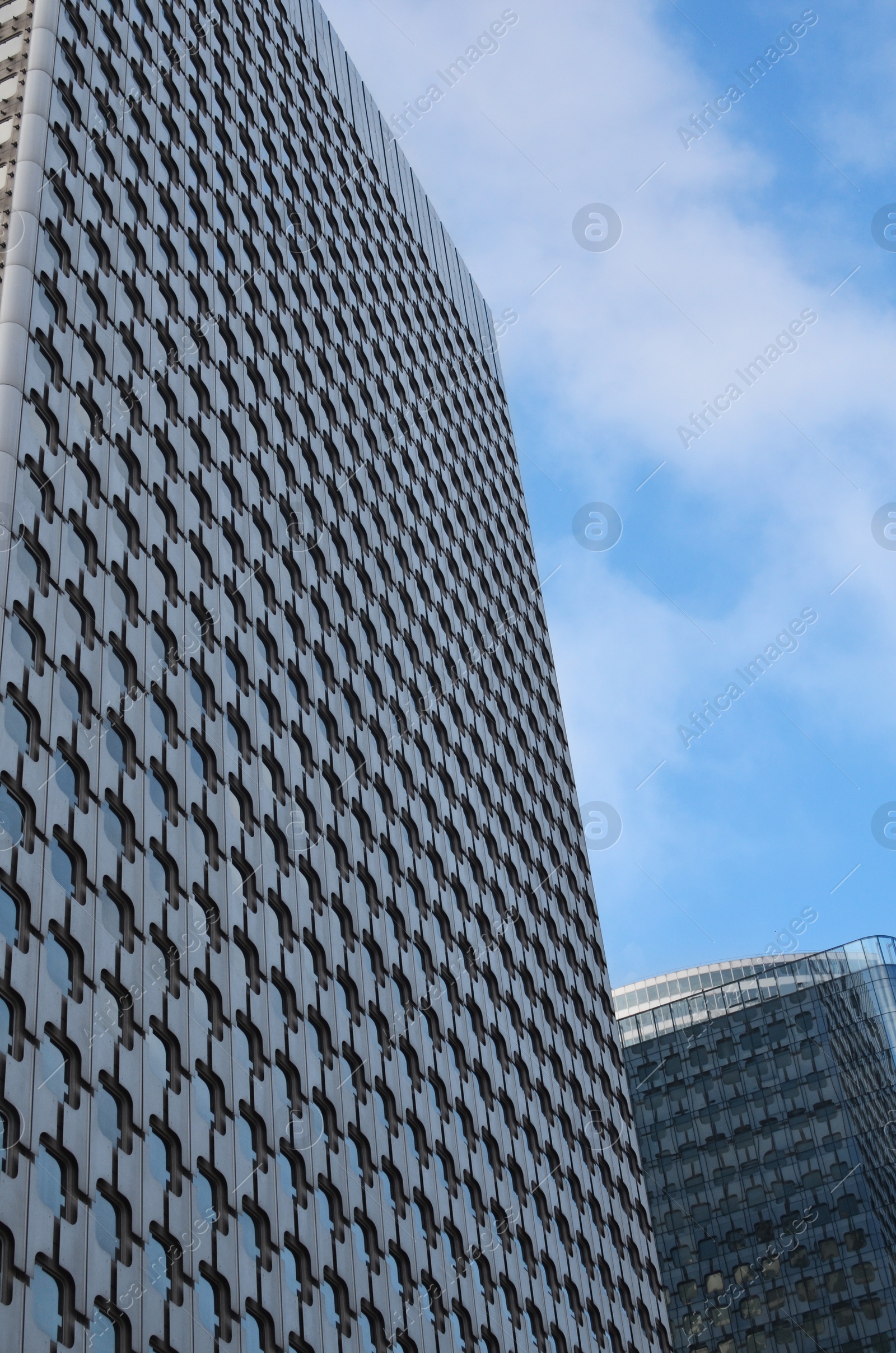 Photo of Exterior of modern skyscrapers against blue sky