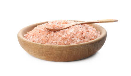 Photo of Wooden bowl and spoon with pink himalayan salt on white background