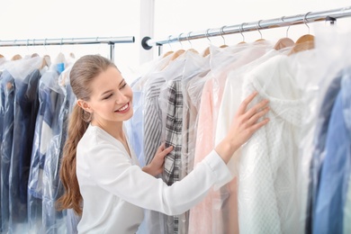 Female employee working at dry-cleaner's