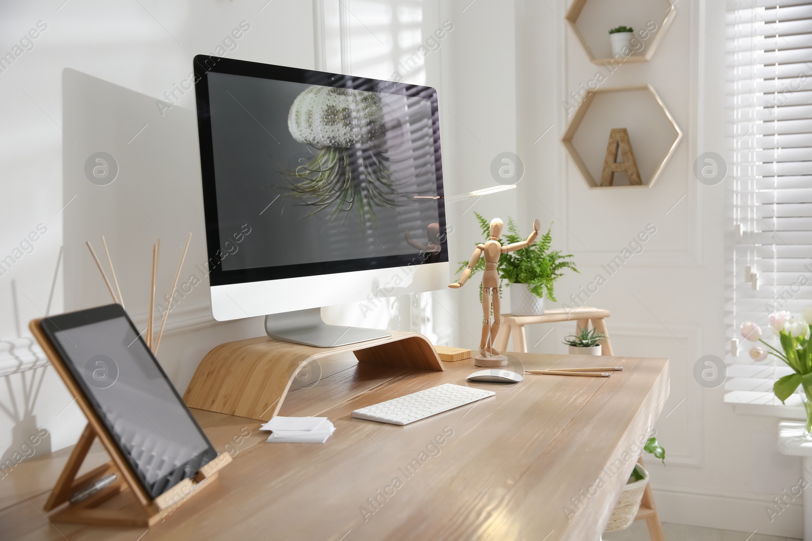 Photo of Stylish home office interior with comfortable workplace