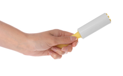 Photo of Woman holding lint roller on white background, closeup