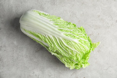 Photo of Fresh ripe cabbage on table, top view