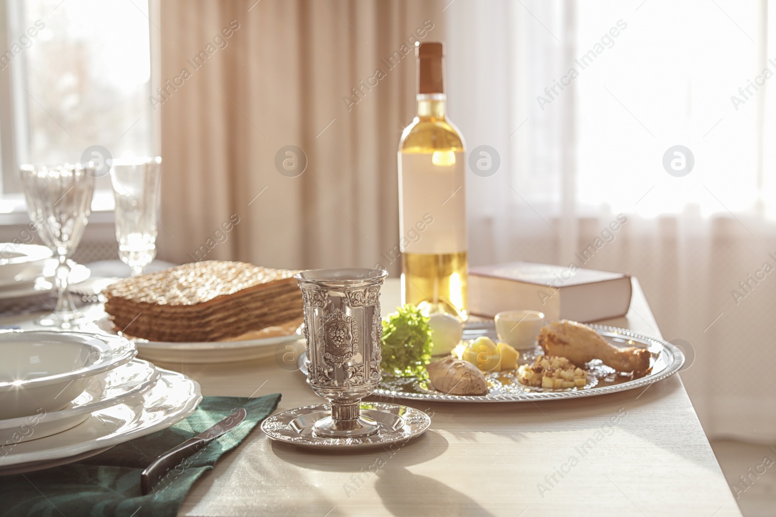 Photo of Table served for Passover (Pesach) Seder indoors, space for text