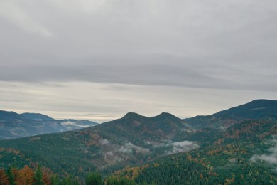 Photo of Aerial view of beautiful mountain landscape on cloudy day