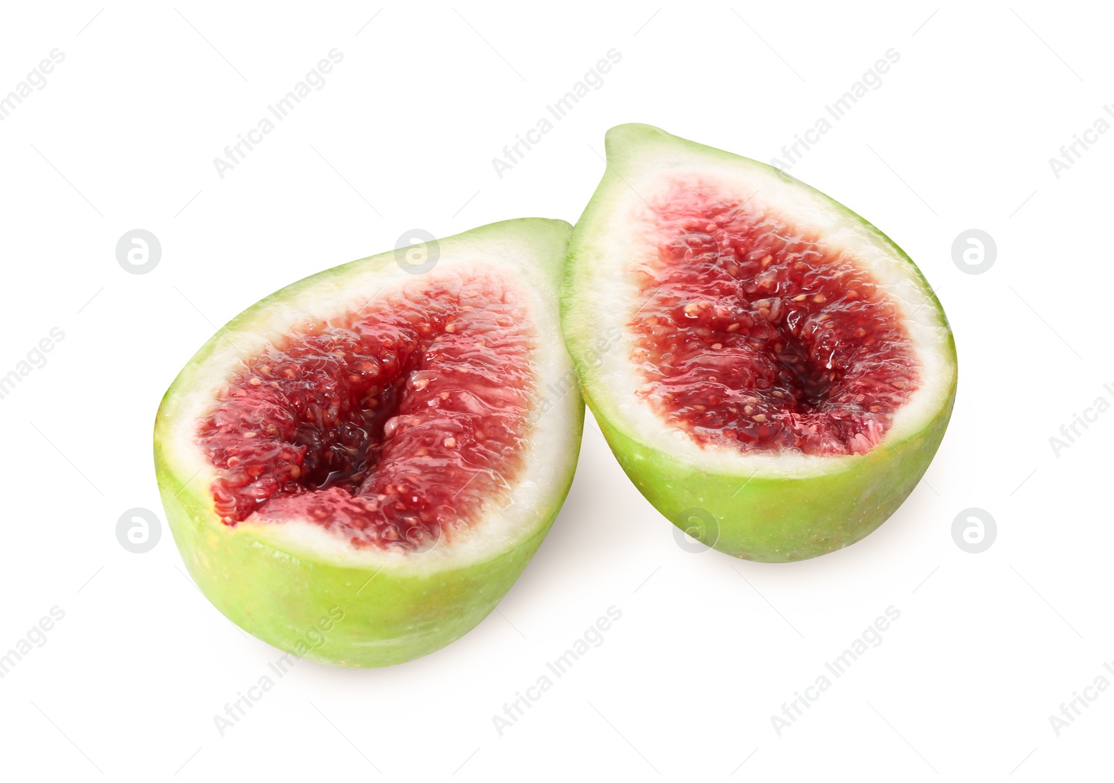 Photo of Halves of fresh green fig isolated on white