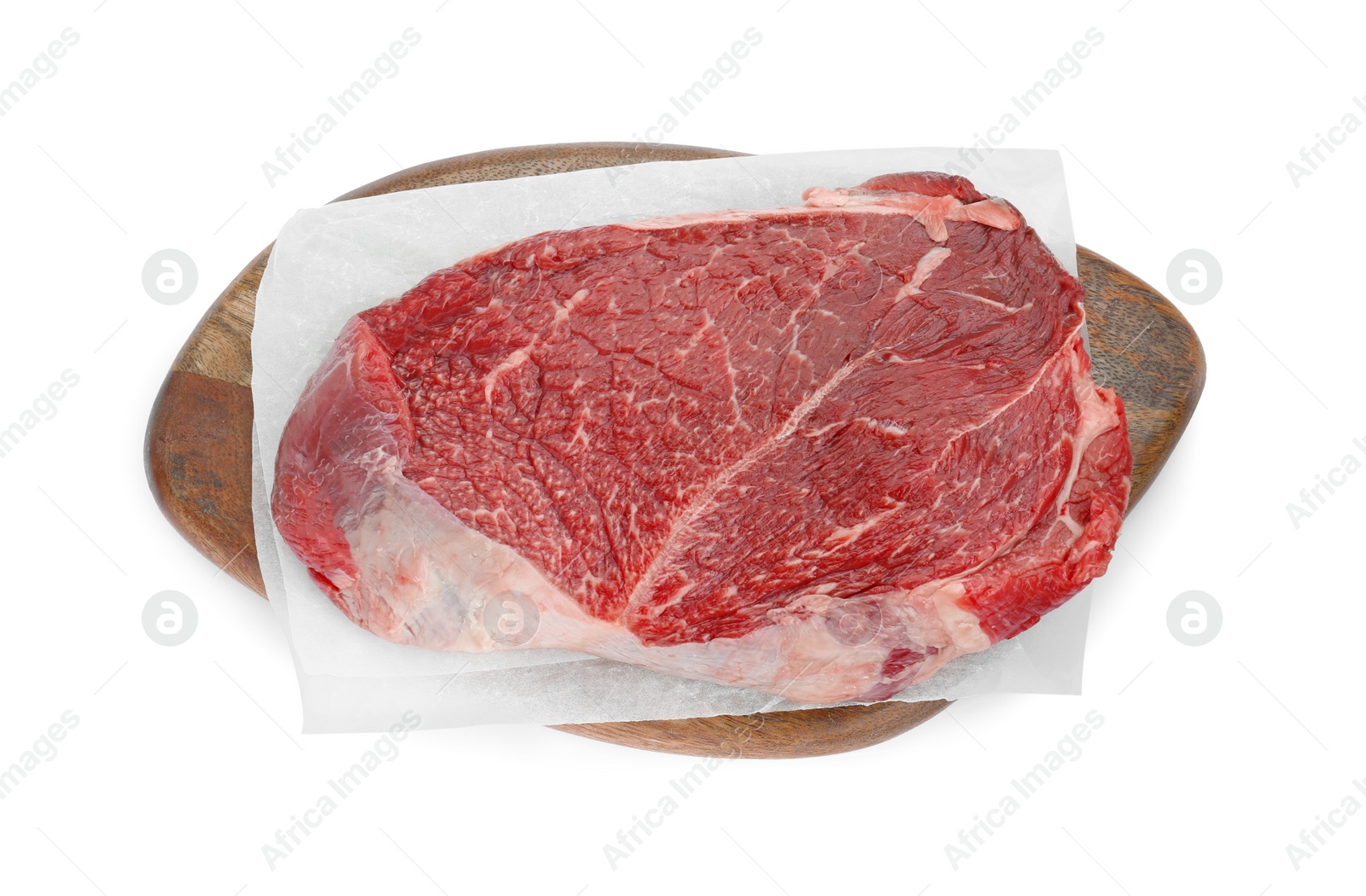 Photo of Wooden board with piece of raw beef meat isolated on white, top view