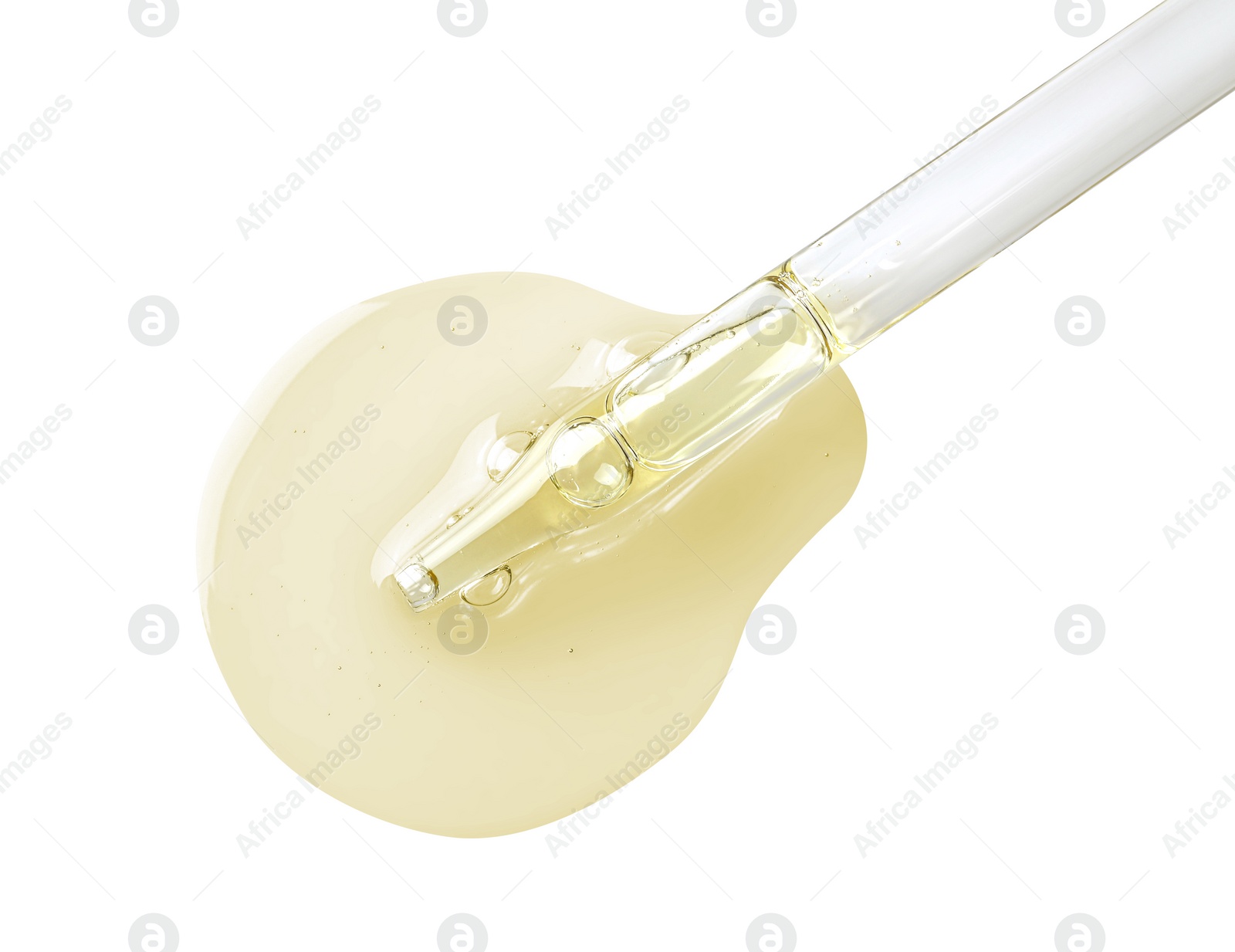 Image of Drop of hydrophilic oil from pipette on white background