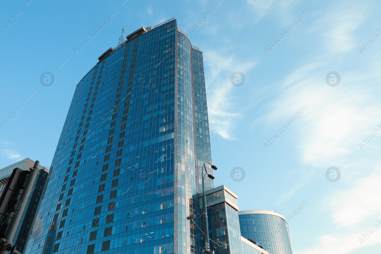 Photo of Beautiful modern building on sunny day, low angle view