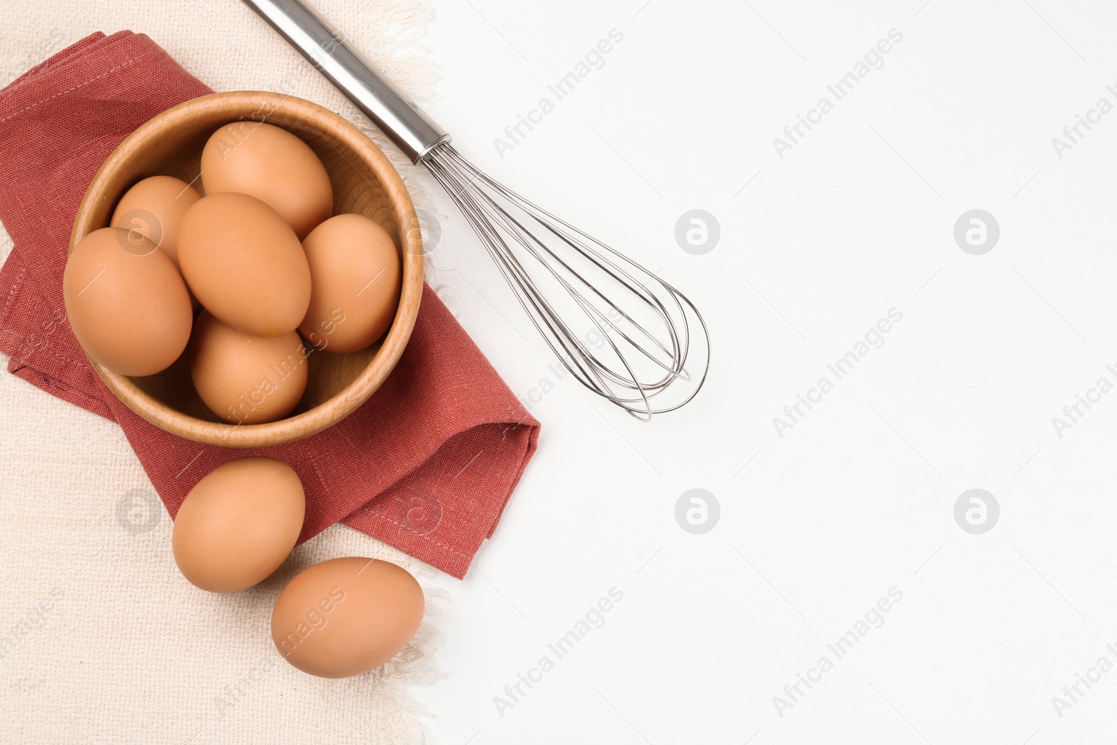 Photo of Flat lay composition with raw eggs on white table, space for text. Baking pie