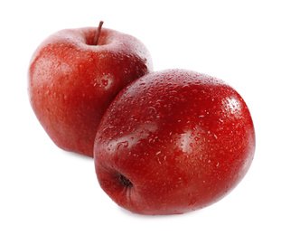 Photo of Fresh juicy red apples with water drops isolated on white