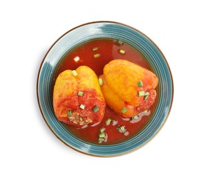 Photo of Plate with delicious stuffed peppers isolated on white, top view