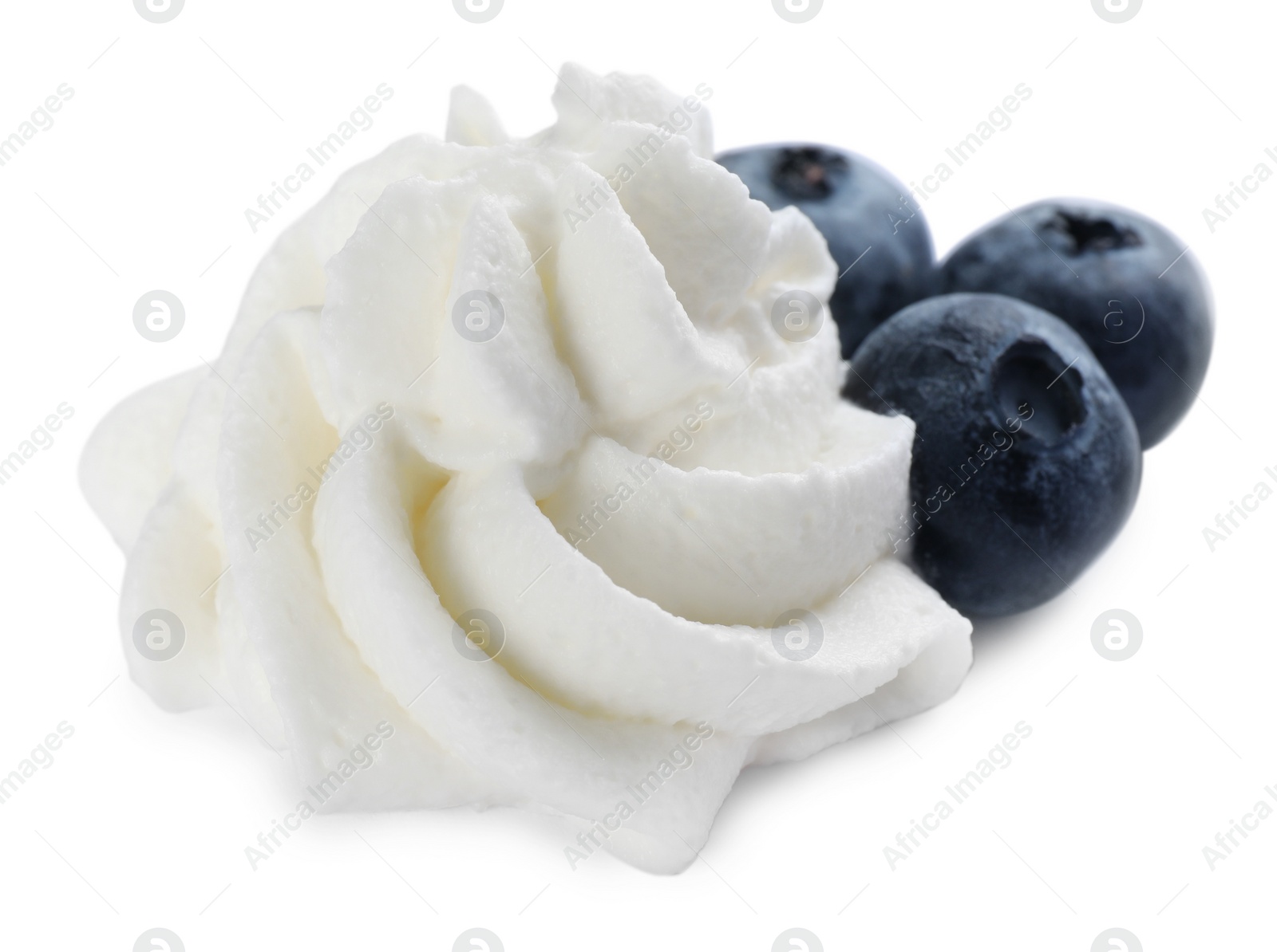 Photo of Delicious fresh whipped cream with blueberries isolated on white