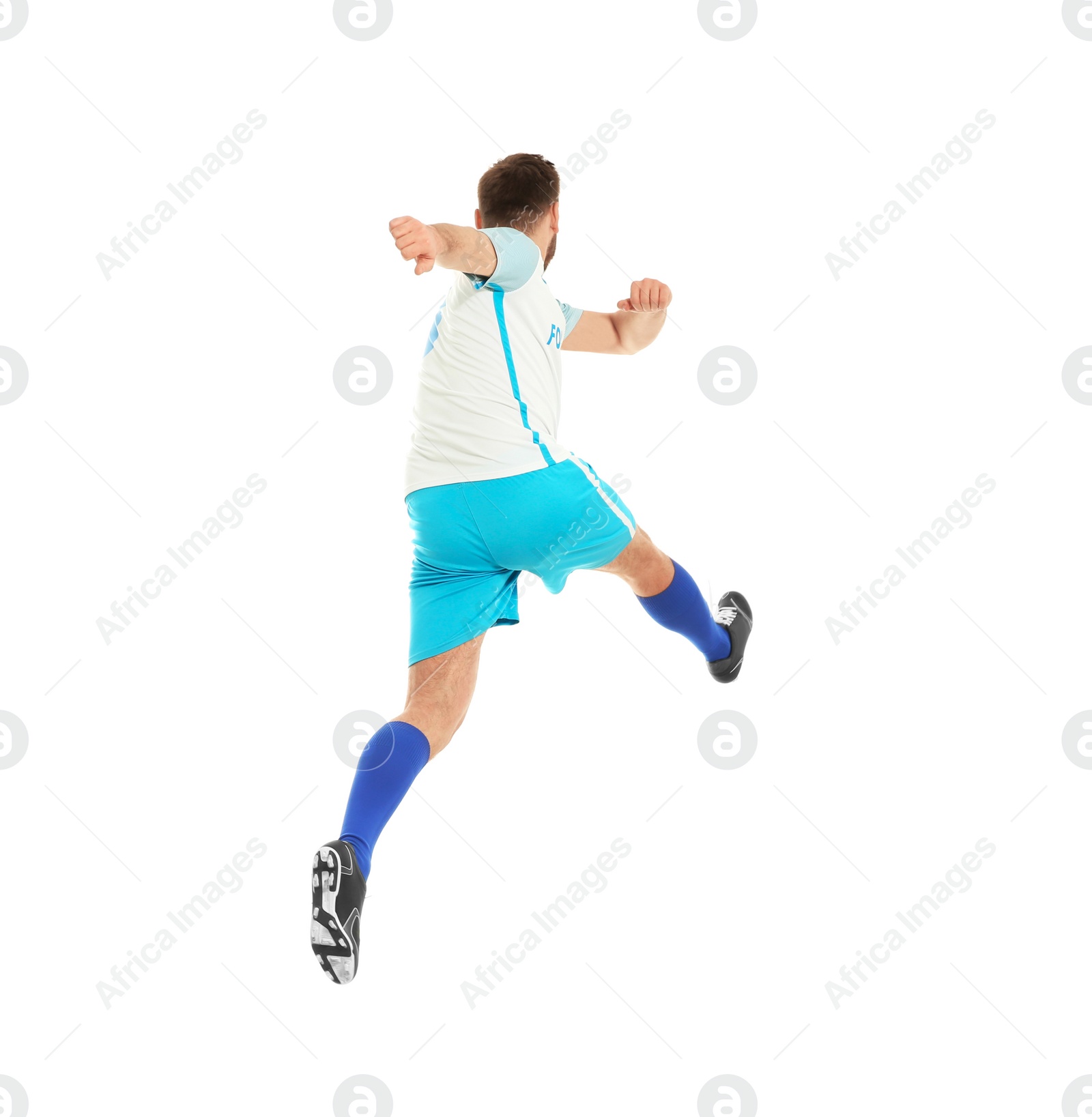 Photo of Young man playing football on white background