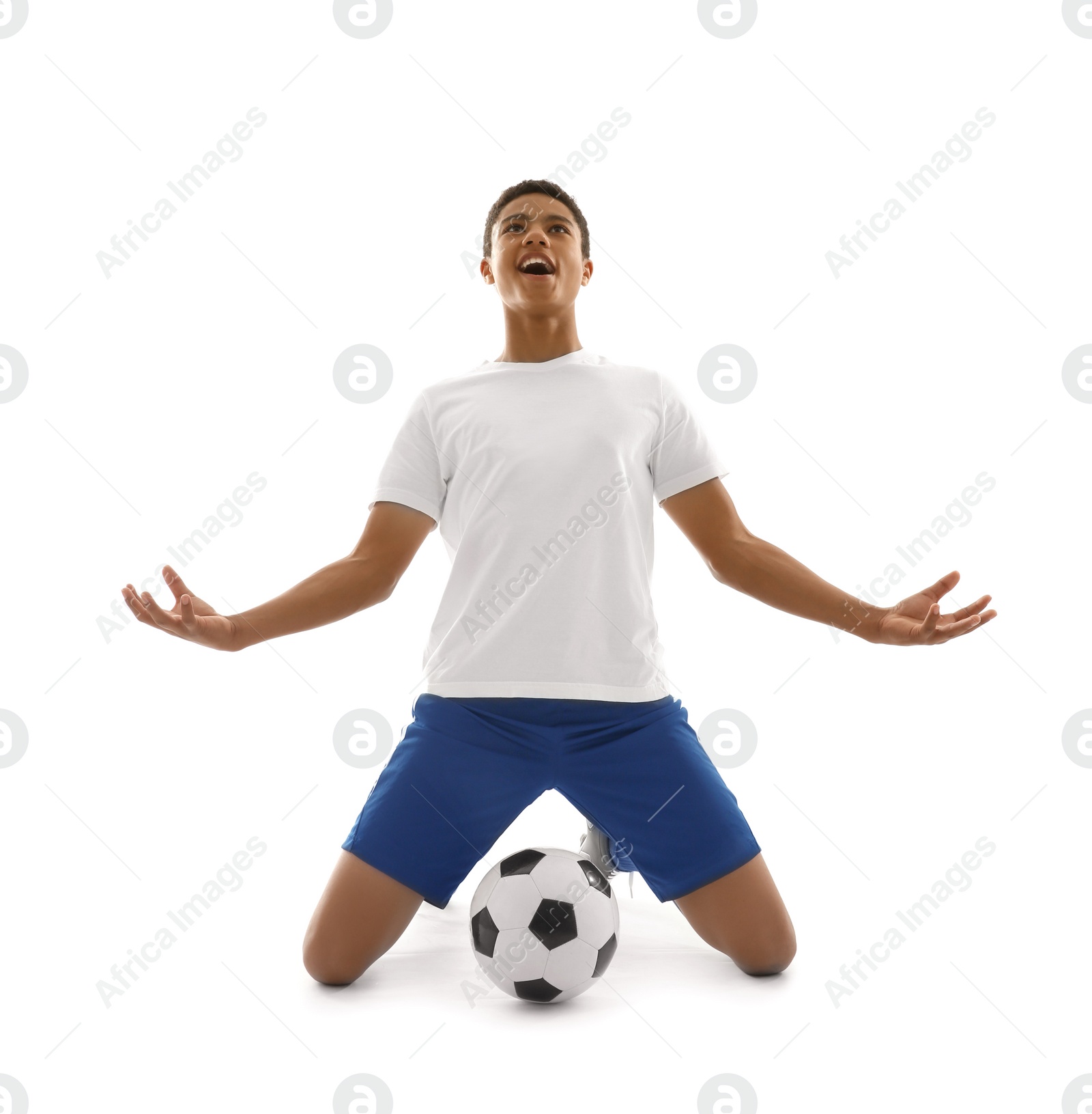 Photo of Teenage African-American football player on white background