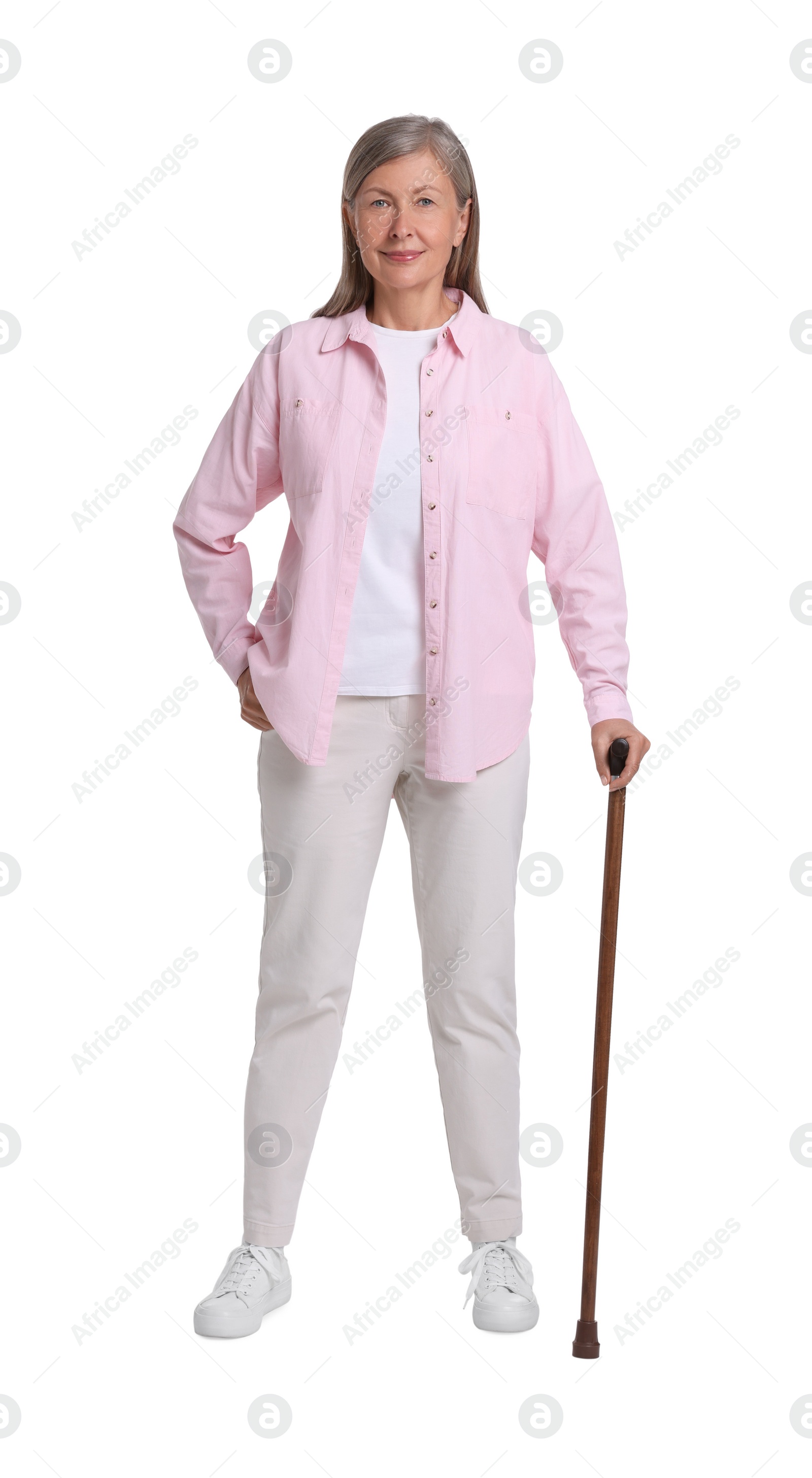 Photo of Senior woman with walking cane on white background