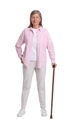 Senior woman with walking cane on white background