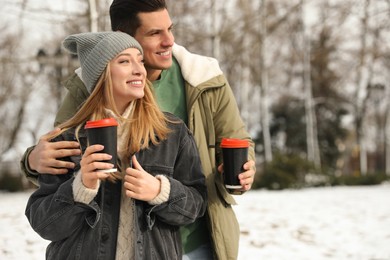 Photo of Beautiful happy couple outdoors on winter day