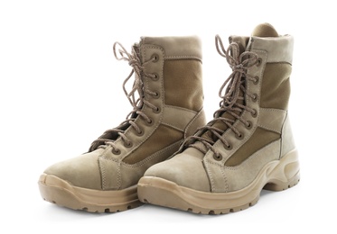 Photo of Pair of combat boots on white background