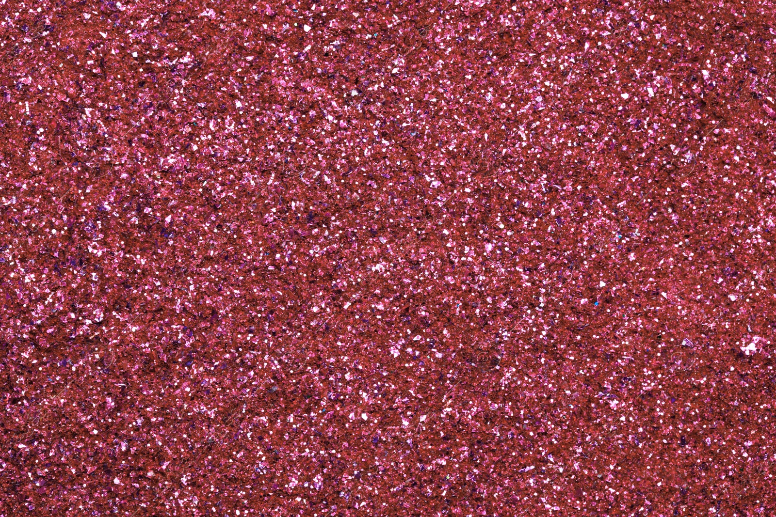 Photo of Beautiful pink shiny glitter as background, top view