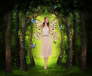 Fairy walking in magic forest. Girl with butterfly wings among trees