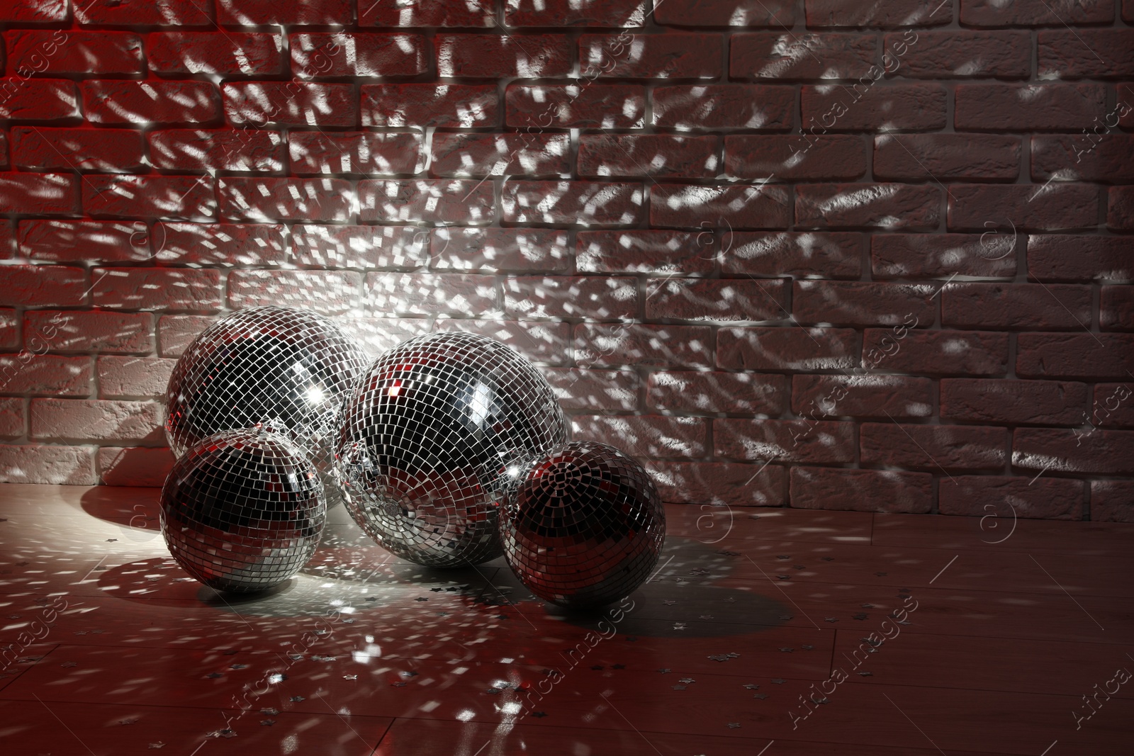Photo of Many shiny disco balls indoors, color toned. Space for text