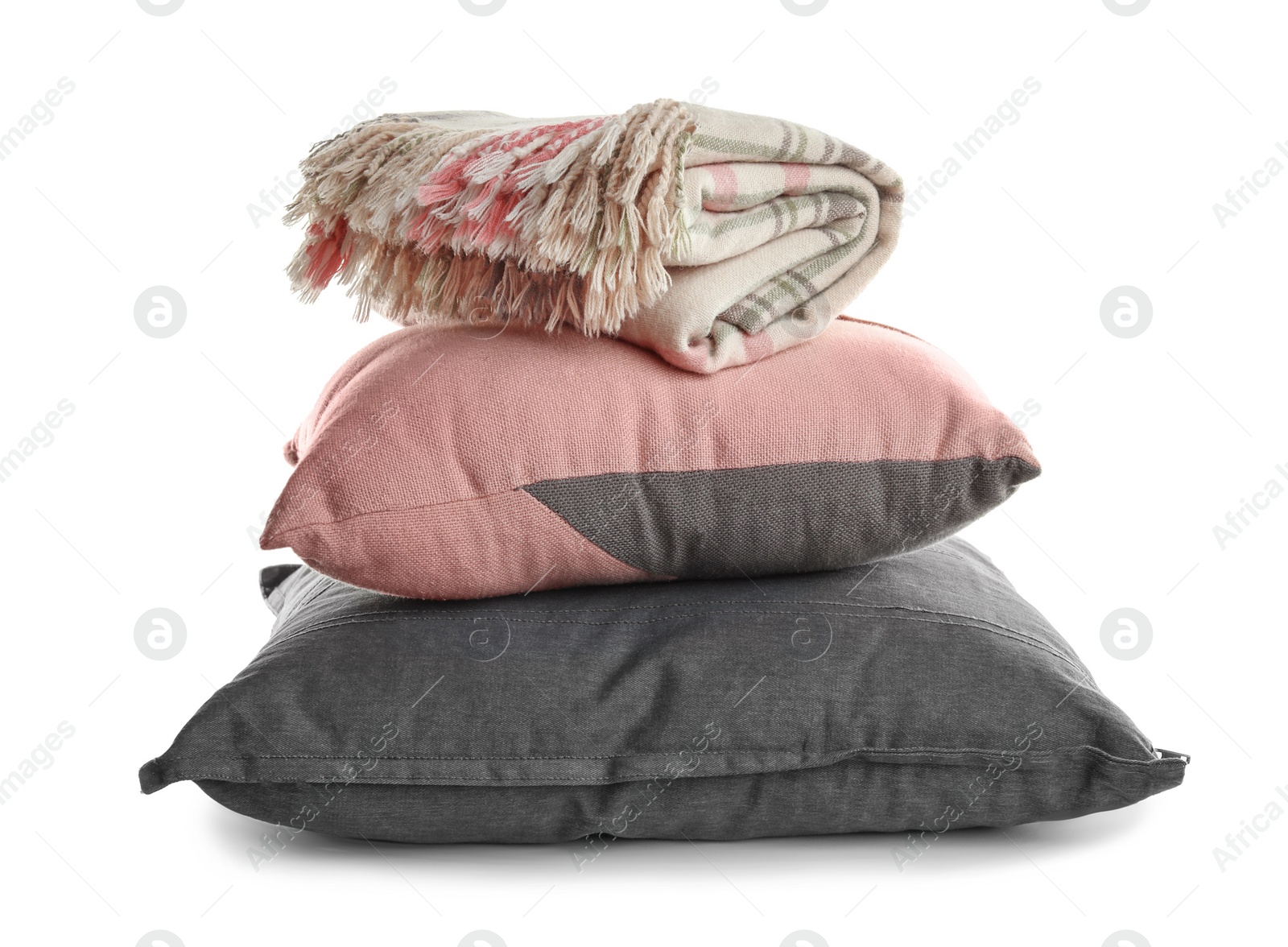 Photo of Stylish soft pillows and folded plaid on white background